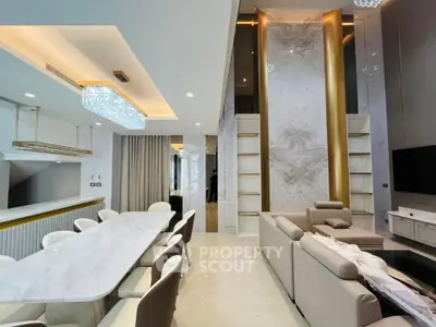 Luxurious modern living room with elegant dining area and high ceilings