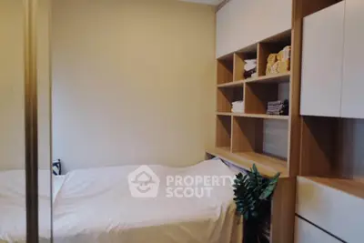 Cozy bedroom with built-in storage and minimalist design