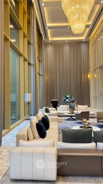 Luxurious high-ceiling living room with elegant decor and modern furniture in a sophisticated setting.