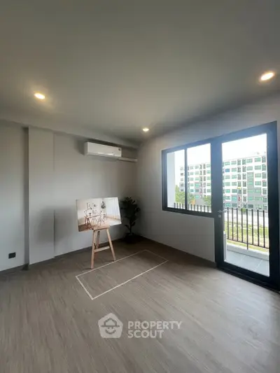 Modern living room with balcony view in a stylish apartment