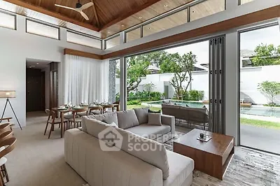 Luxurious open-plan living room with garden view and elegant dining area in modern villa.