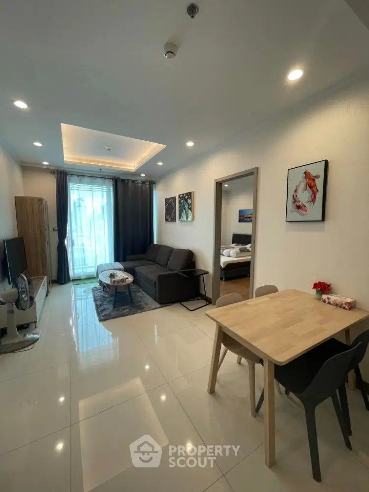 Modern living room with sleek design, open layout, and stylish decor in a contemporary apartment.