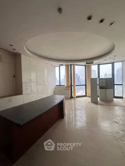 Spacious kitchen with panoramic city views and modern cabinetry