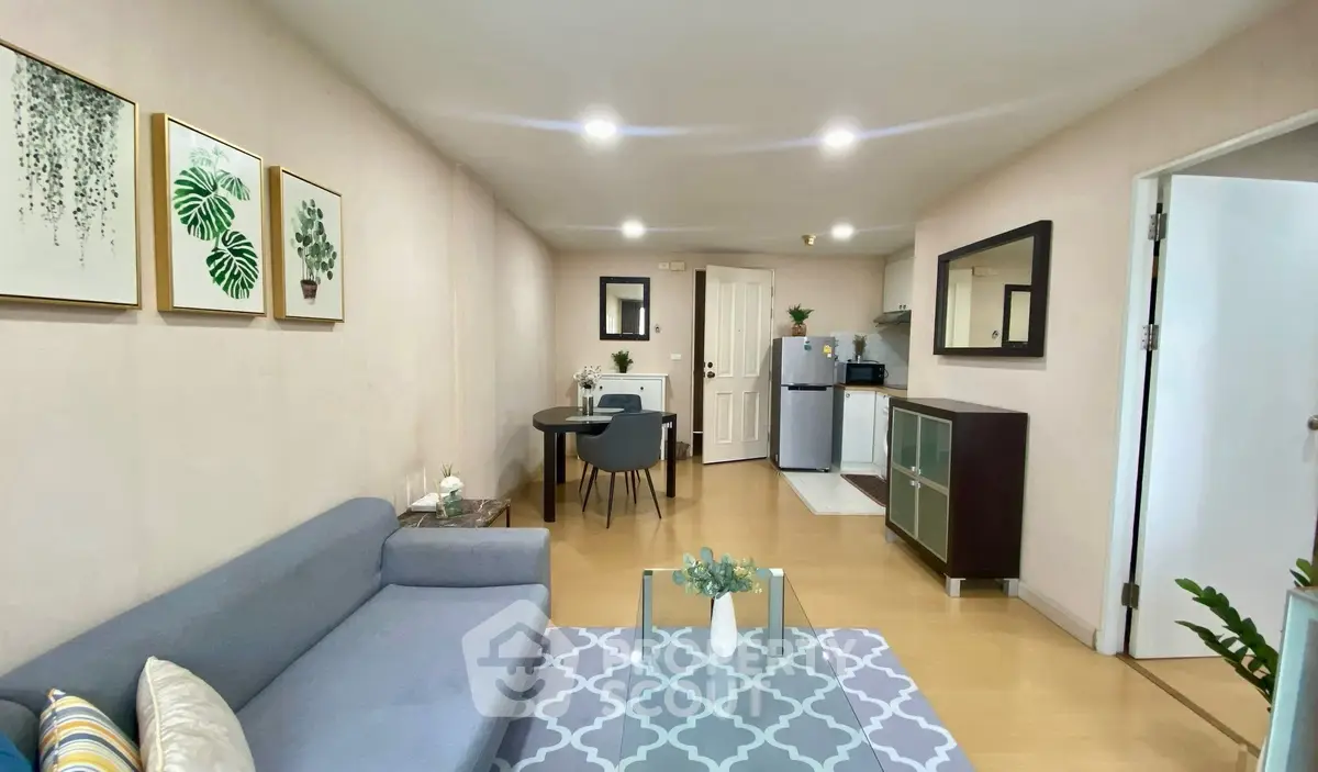 Modern living room with stylish decor and open kitchen layout