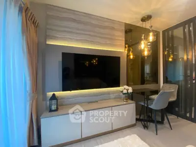 Modern living room with stylish lighting and sleek TV setup, perfect for contemporary living.