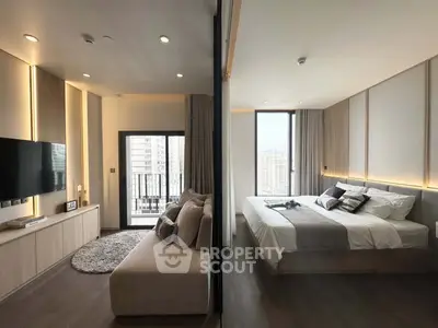 Modern apartment with spacious living room and cozy bedroom, featuring large windows and stylish decor.