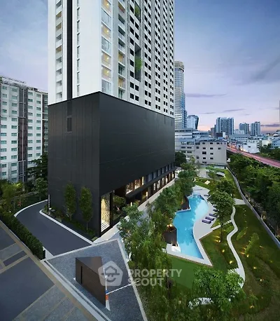 Modern high-rise building with pool and landscaped garden in urban setting