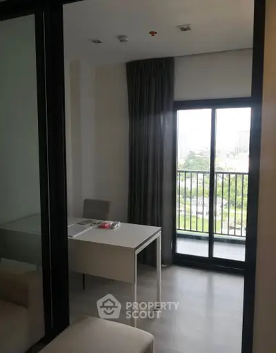 Modern study room with balcony view in urban apartment