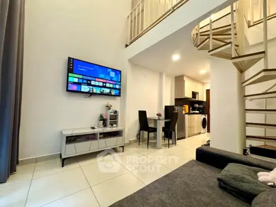 Modern duplex living room with open kitchen and spiral staircase