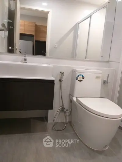 Modern bathroom with sleek fixtures and spacious layout