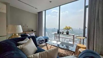 Luxurious living room with panoramic city view and elegant decor