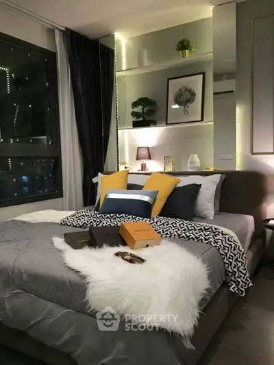 Luxurious modern bedroom with stylish decor and ambient lighting