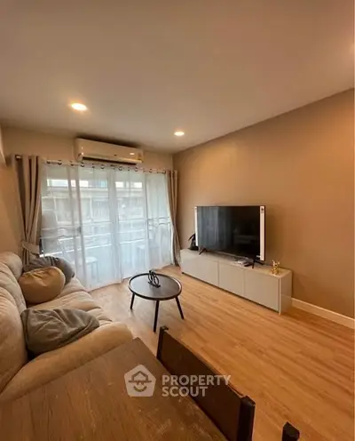 Cozy living room with modern decor and natural light