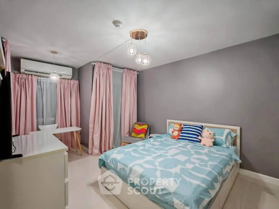 Charming bedroom with modern decor and cozy ambiance, perfect for relaxation and comfort.