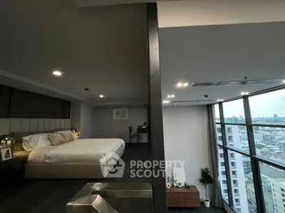 Luxurious modern bedroom with stunning city view and elegant decor
