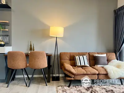 Stylish modern living room with cozy brown sofa and elegant floor lamp