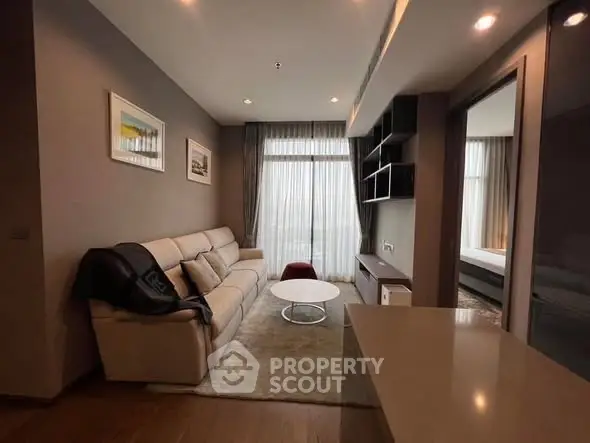 Modern living room with cozy sofa and elegant decor in a stylish apartment