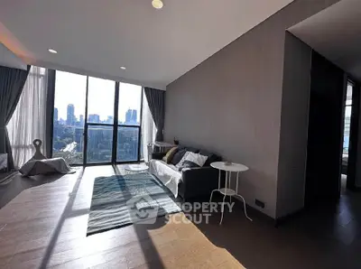 Spacious modern living room with panoramic city views and elegant decor