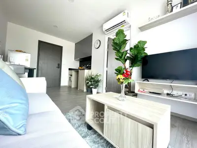 Modern living room with stylish decor, open layout, and natural light