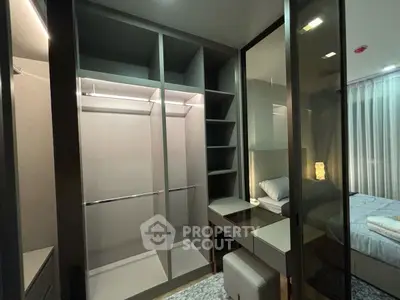 Modern bedroom with walk-in closet and sleek design
