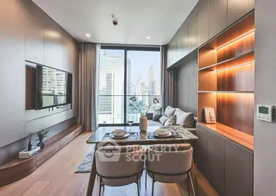 Modern living room with city view, stylish furniture, and elegant decor.