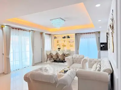 Luxurious living room with elegant furniture and ambient lighting, perfect for modern living.