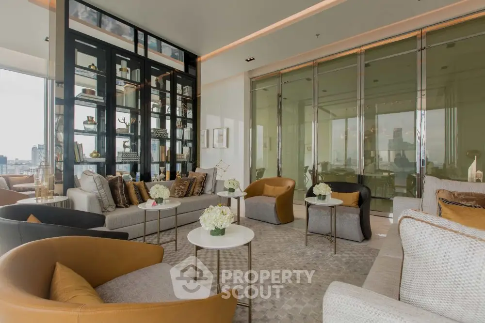 Luxurious modern living room with elegant decor and panoramic city view.