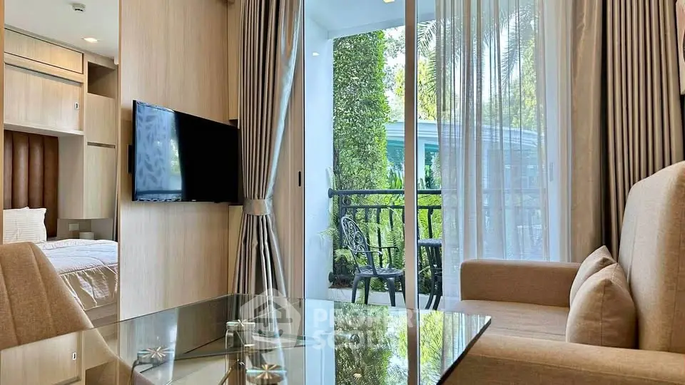 Modern living room with balcony view and elegant furnishings