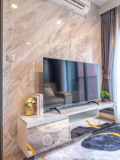 Modern living room with sleek TV setup and stylish decor