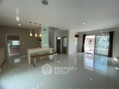 Spacious modern living room with open layout and natural light