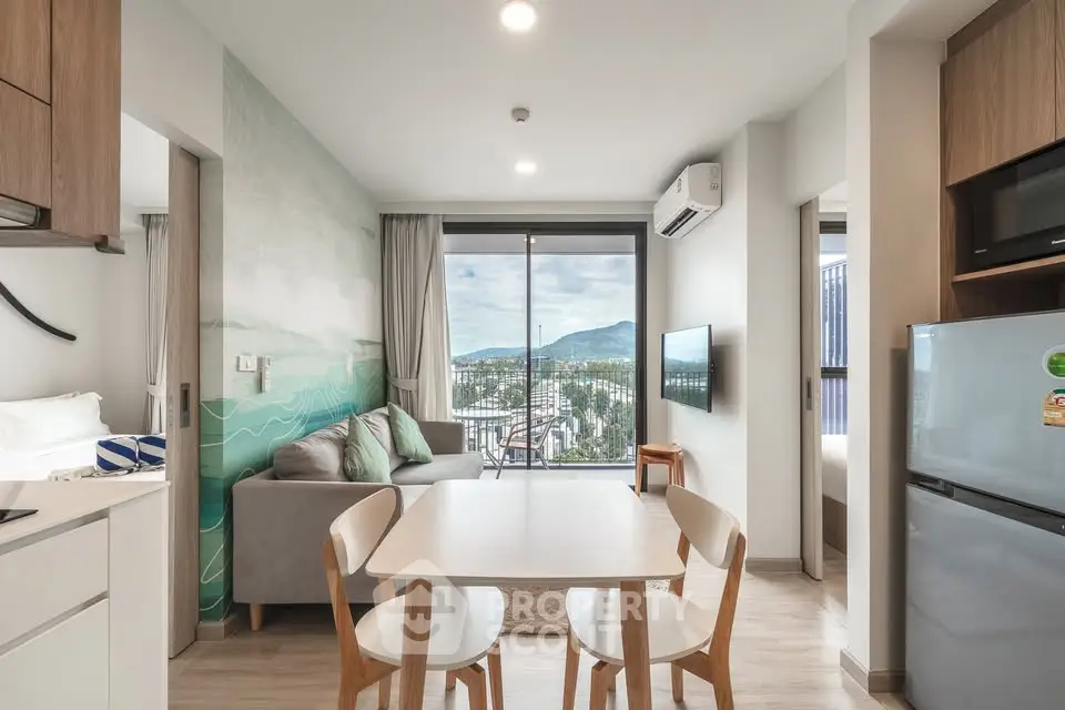 Modern open-plan living room with mountain view and stylish decor