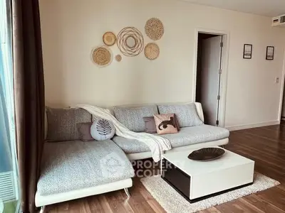 Modern living room with stylish decor and cozy seating area.