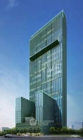 Stunning modern skyscraper with sleek glass facade and unique architectural design in urban setting.