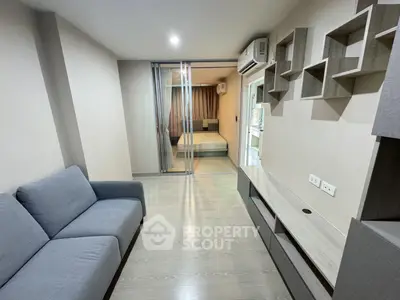 Modern apartment interior with stylish living room and bedroom separation