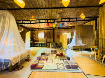 Charming rustic living room with bamboo decor and cozy seating area