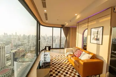 Luxurious living room with panoramic city view and modern decor