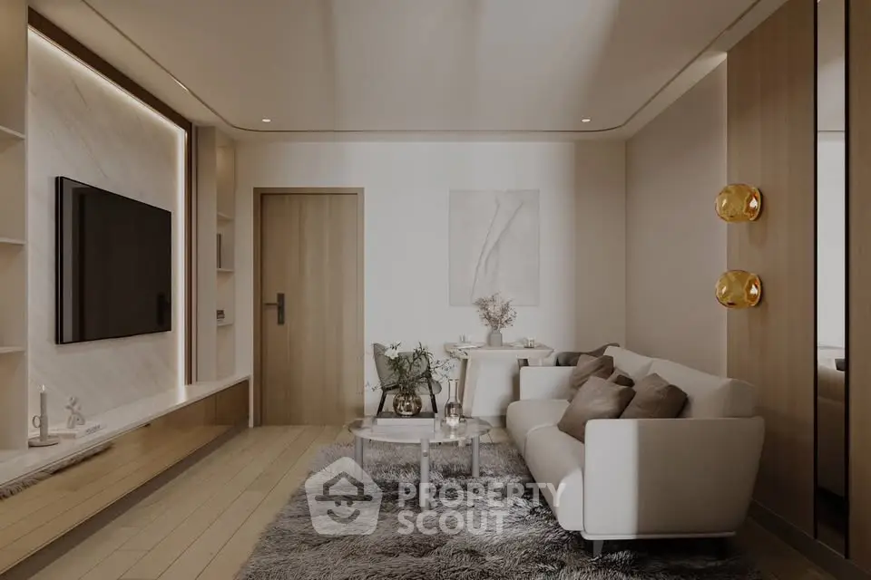 Modern living room with cozy sofa, stylish decor, and wall-mounted TV in elegant apartment.