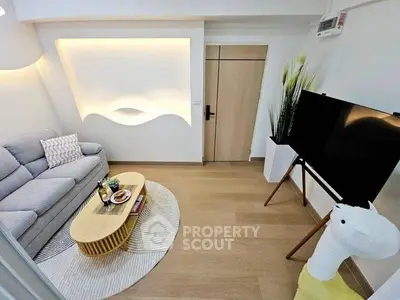 Modern living room with stylish decor and cozy seating area