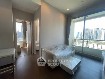 Modern living room with city view and large balcony in luxury apartment