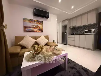 Modern living room with stylish decor and open kitchen layout