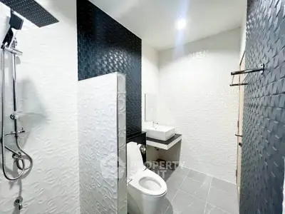 Modern bathroom with sleek design and textured walls