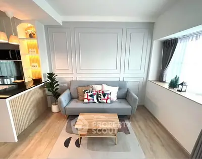 Stylish modern living room with cozy sofa and elegant decor