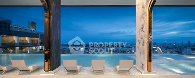 Luxurious rooftop infinity pool with stunning city skyline view at dusk.