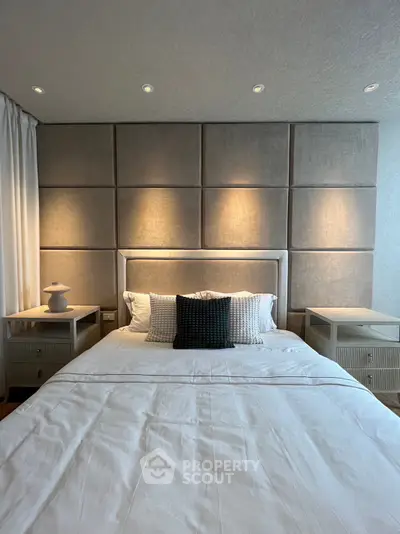 Luxurious bedroom with elegant lighting and modern decor