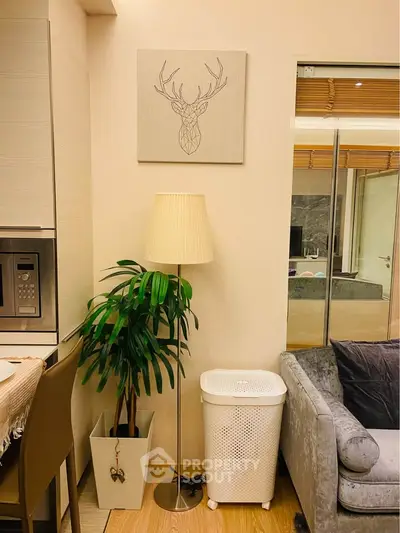 Cozy living room corner with modern decor and stylish lighting