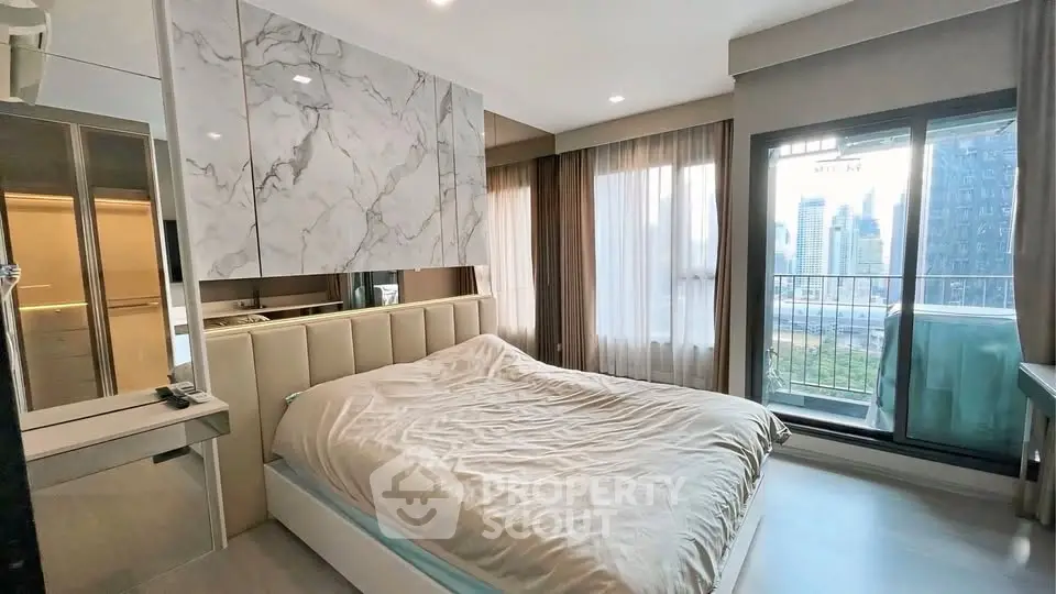 Luxurious bedroom with city view and modern decor in high-rise apartment