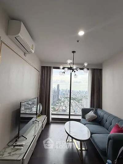 Modern living room with stunning city view, stylish furniture, and elegant lighting.