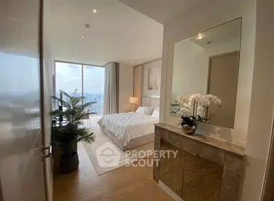 Luxurious bedroom with stunning city view and elegant decor