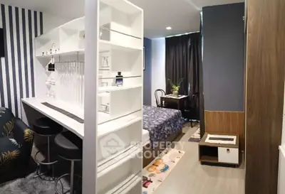 Modern studio apartment with stylish decor and functional layout