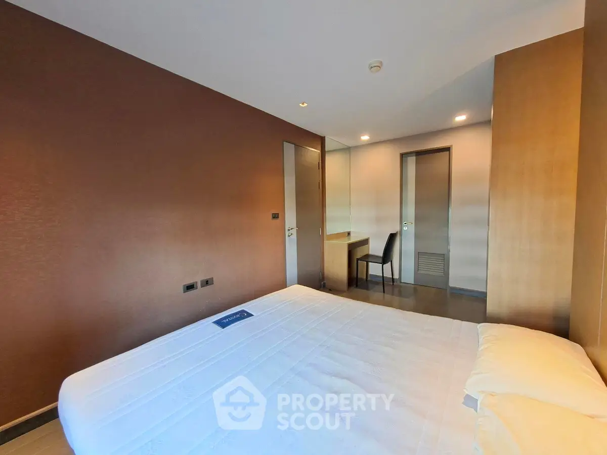 Spacious bedroom with modern design and cozy ambiance